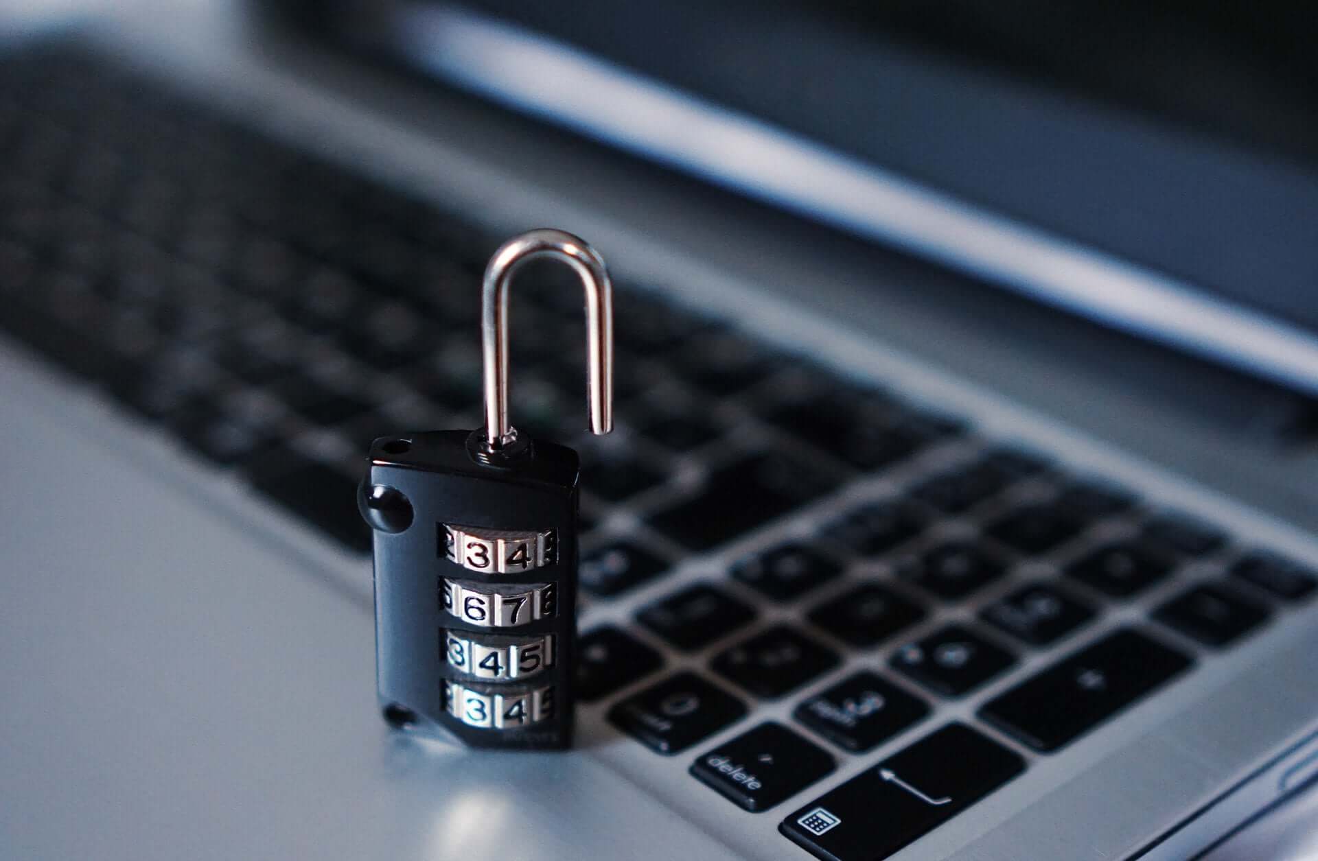 A black padlock on a laptop keyboard, used for the Digital Lychee anti-SPAM blog