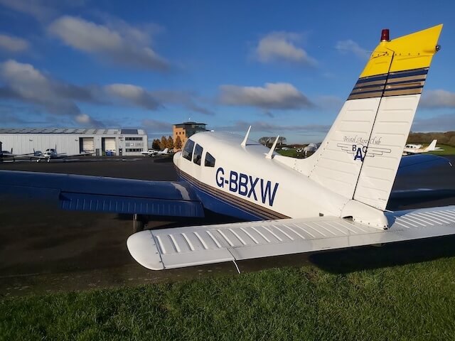 G-BBXW, a PA28 aircraft of the Bristol Aero Club, parked on a sunny day